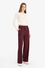 High-waisted, regular length trousers with three pockets and wide legs