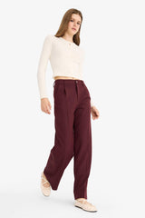 High-waisted, regular length trousers with three pockets and wide legs