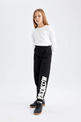 Girls Printed Black Jogger Sweatpants with Elastic Waistband