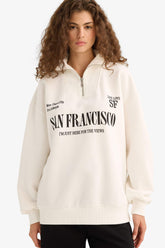 Oversized wide fit sweatshirt with a printed half-zip