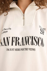 Oversized wide fit sweatshirt with a printed half-zip