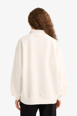 Oversized wide fit sweatshirt with a printed half-zip