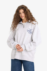 Oversized wide fit sweatshirt with a printed half-zip