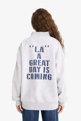 Oversized wide fit sweatshirt with a printed half-zip