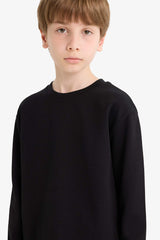 T-shirt for boys with long sleeves, loose fit, round neck.