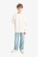 T-shirt for boys with long sleeves, loose fit, round neck.