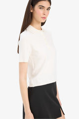 Fitted knit sweater with a polo collar