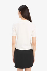 Fitted knit sweater with a polo collar