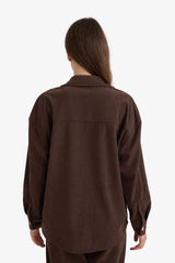 Loose corduroy shirt with a shirt collar and long sleeves