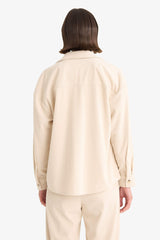 Loose corduroy shirt with a shirt collar and long sleeves