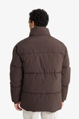 Water-repellent, regular fit, stand-collar jacket with inner zippered pockets.