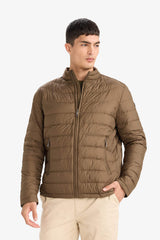 Water-repellent goose down jacket with slim fit, narrow cut, stand-collar, inner pocket detail, and zippered pockets.