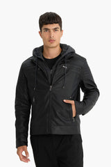 Water-repellent, slim-fit, narrow-cut faux leather jacket with removable hood, plush lining, and zip closure.