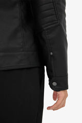 Water-repellent, slim-fit, narrow-cut faux leather jacket with removable hood, plush lining, and zip closure.