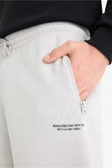 Regular Fit, Tied Waist, Soft Furry Inside, Elasticated Legs, Printed Zipper Pocket Tracksuit Bottoms