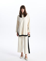 بنطلون تريكو نسائي مع خطوط على الخصر