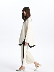 بنطلون تريكو نسائي مع خطوط على الخصر