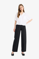 Cool, loose-fitting, high-waisted gabardine trousers