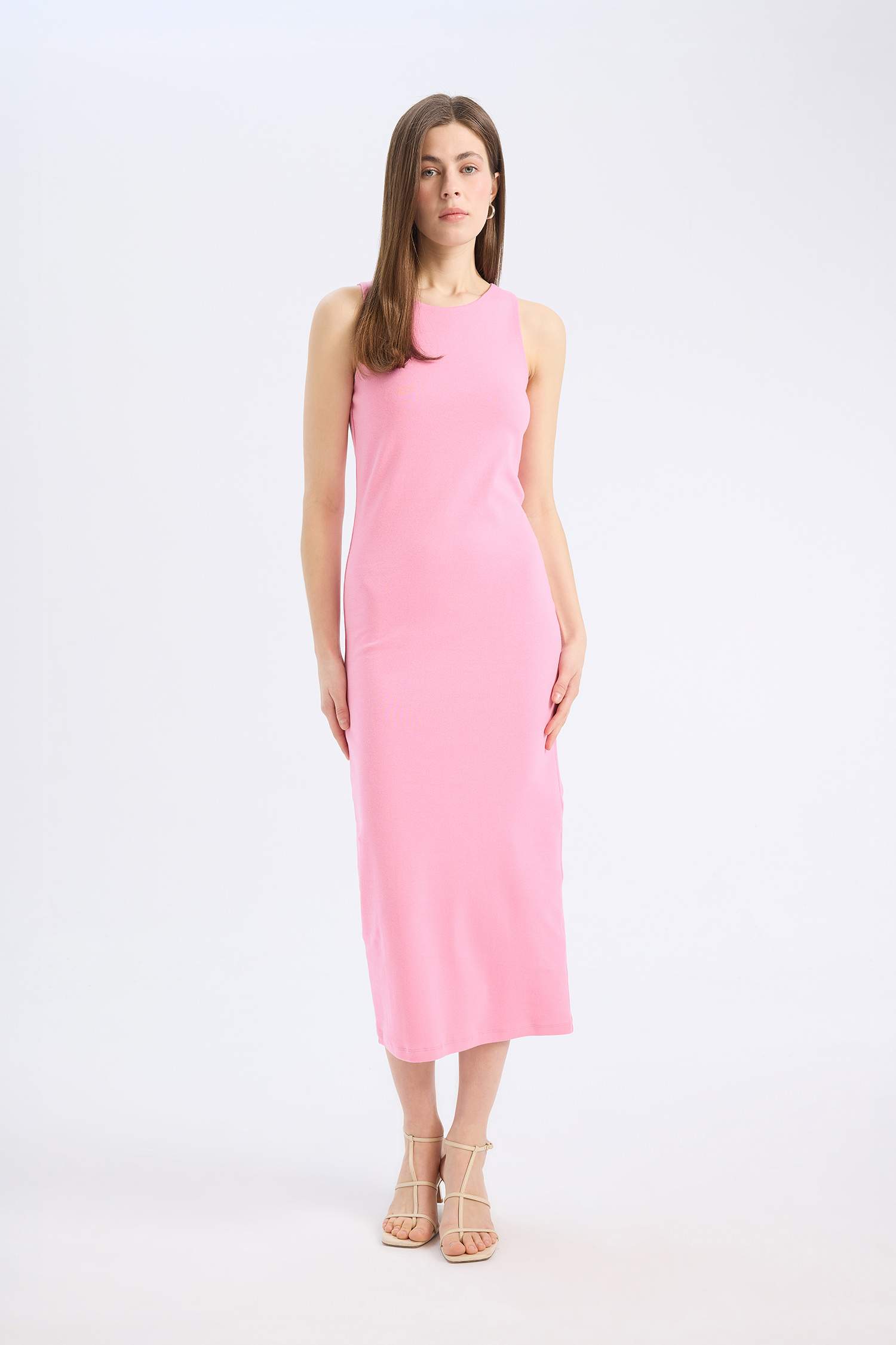 A sleeveless, round neck, ribbed midi dress