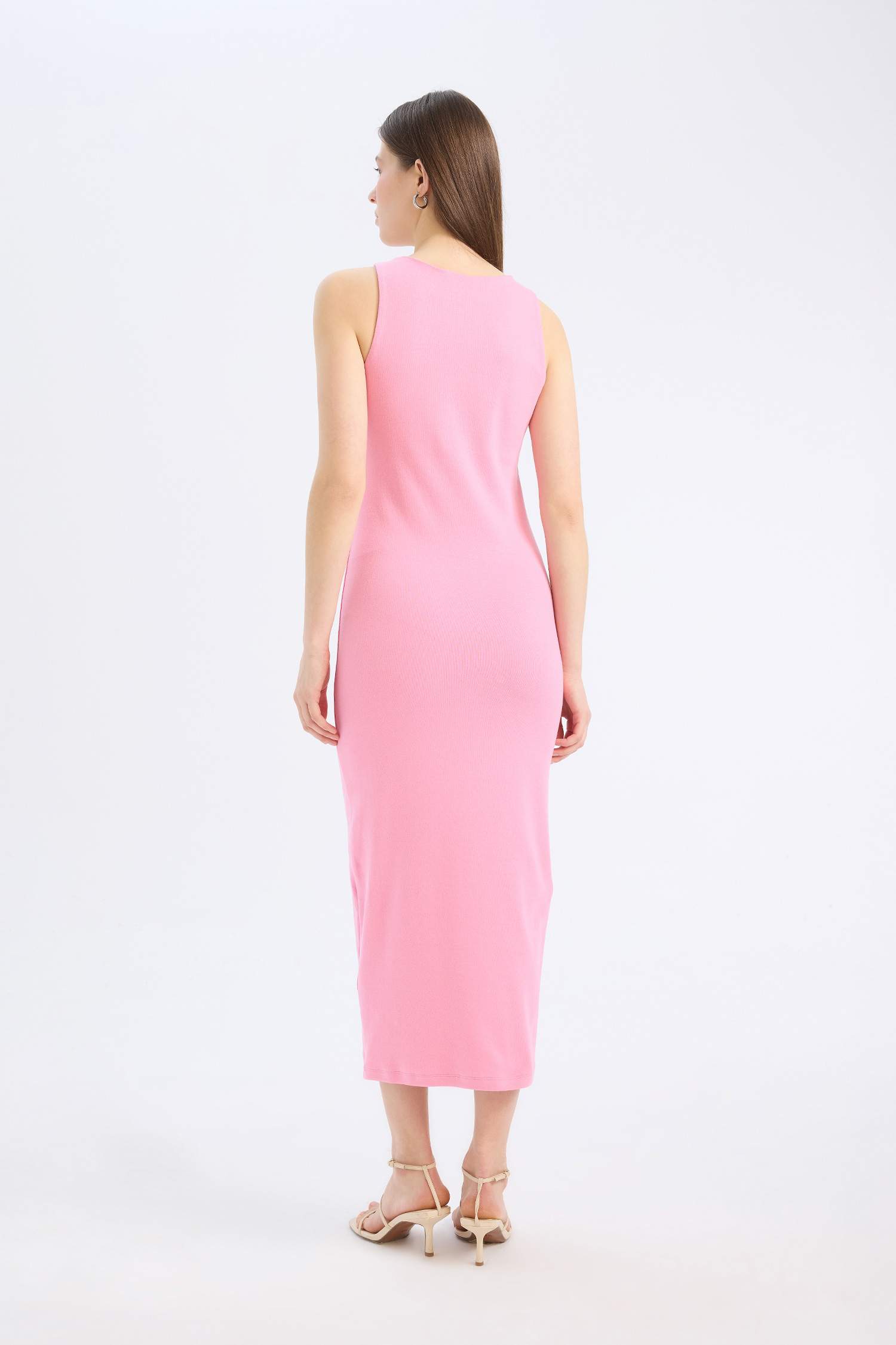 A sleeveless, round neck, ribbed midi dress