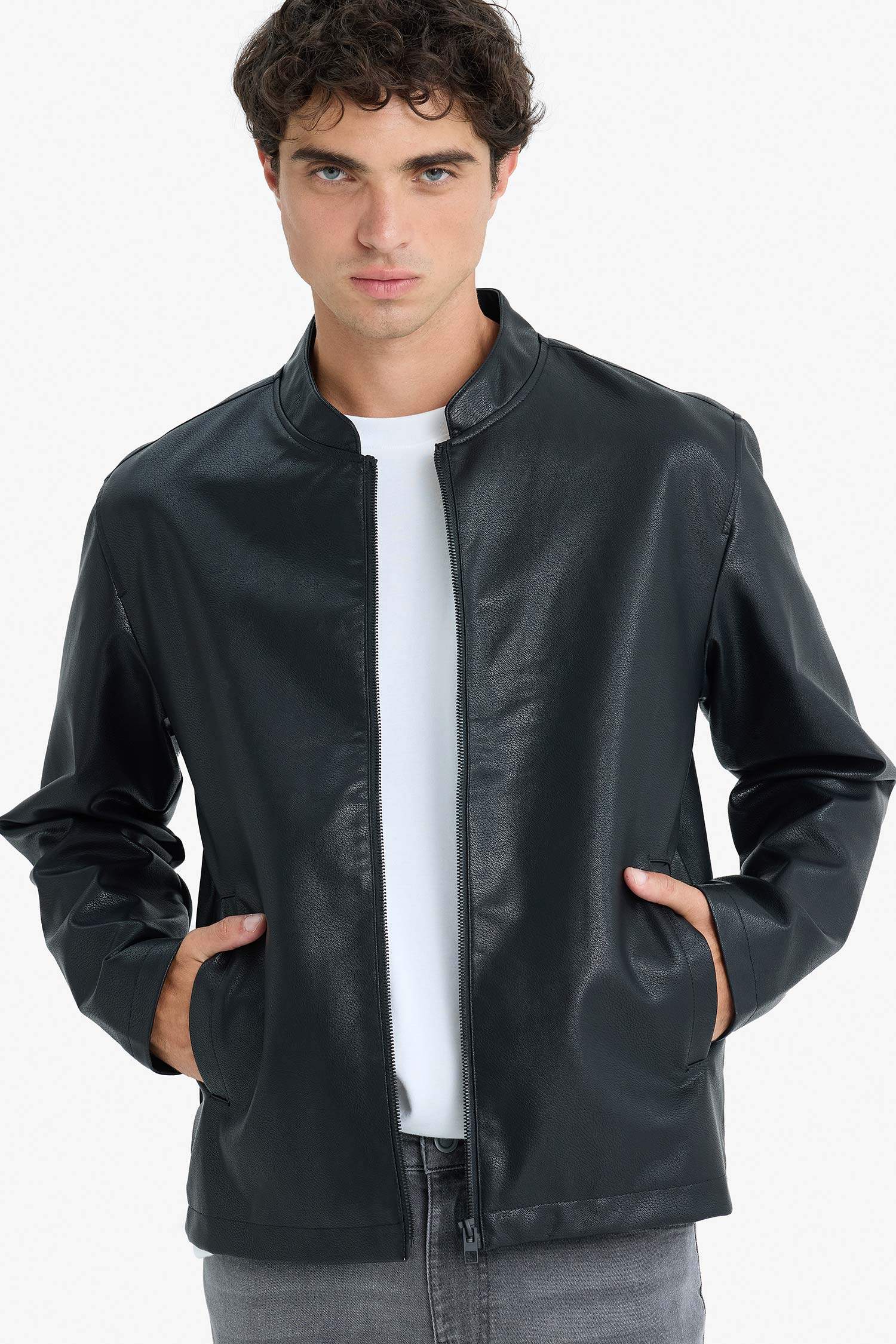 Water-repellent, slim-fit, narrow-cut, stand-collar, zip-up faux leather jacket.