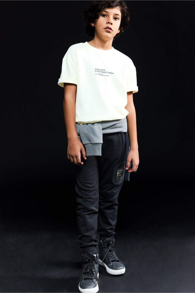 Printed Sweatpants With Elastic Waist And Cuffs For Boys Hover Image