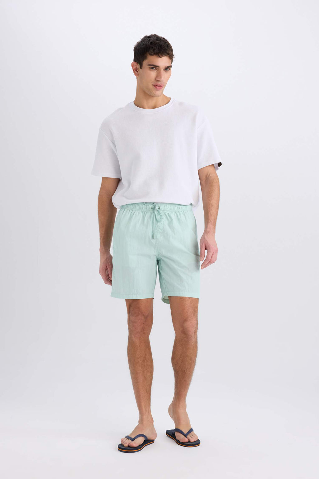 Regular Fit Mesh Lined Above Knee Swim Shorts