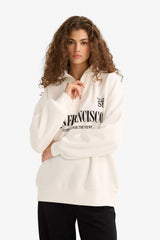 Oversized wide fit sweatshirt with a printed half-zip