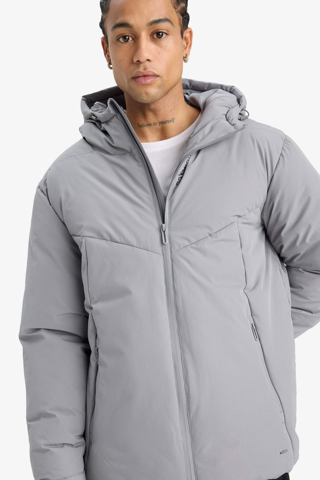 Water-repellent, regular-fit, hooded, zip-up, windproof jacket. Hover Image