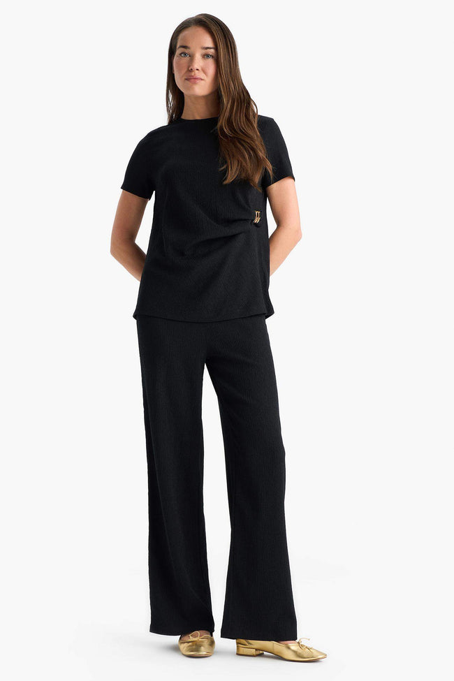 Straight cut, ribbed trousers Hover Image