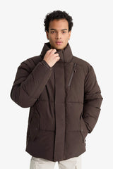 Water-repellent, regular fit, stand-collar jacket with inner zippered pockets.