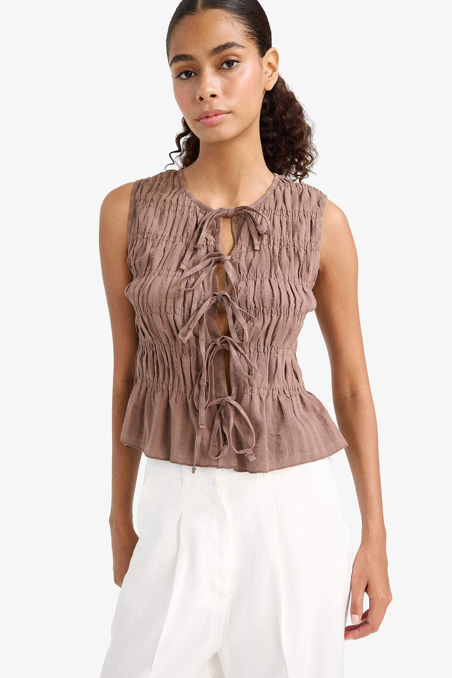 Slim Fit, Slim Cut, Crew Neck, Tied Textured Sleeveless Blouse