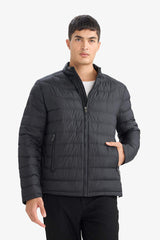 Water-repellent goose down jacket with slim fit, narrow cut, stand-collar, inner pocket detail, and zippered pockets.