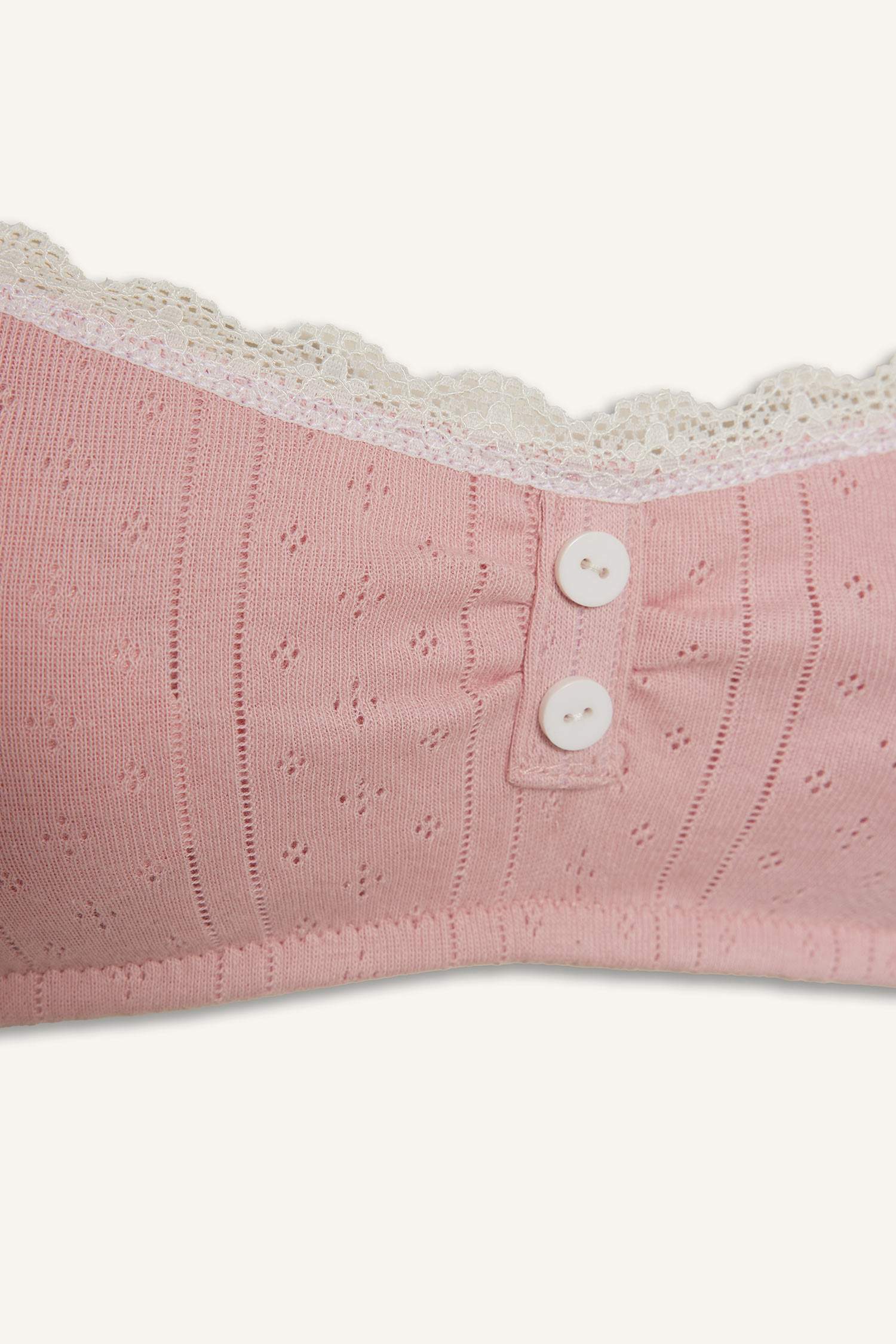 Lace-Detailed Ribbed Bralette With Removable Cups And Padded, Wire-Free Design.