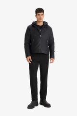 Water-repellent, slim-fit, narrow-cut faux leather jacket with removable hood, plush lining, and zip closure.