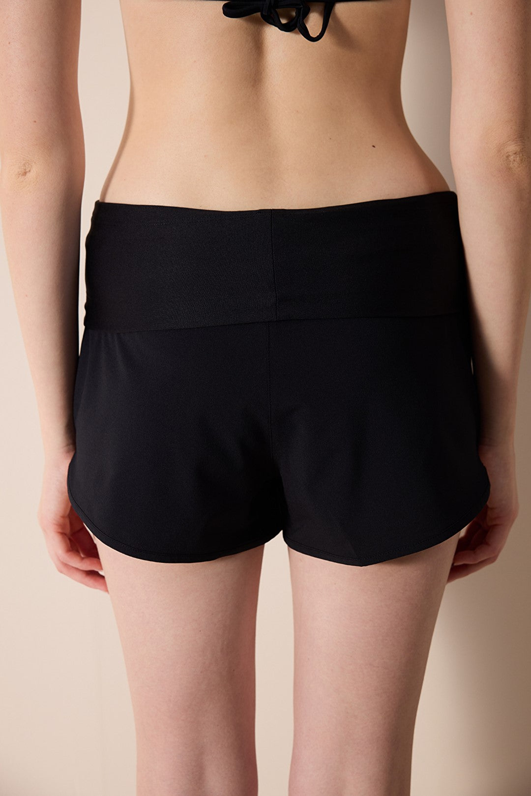 Folded Black Swim Shorts