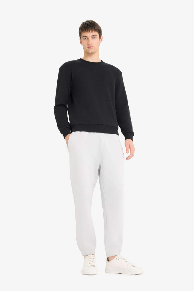 Regular Fit, Tied Waist, Soft Furry Inside, Elasticated Legs, Printed Zipper Pocket Tracksuit Bottoms Main Image