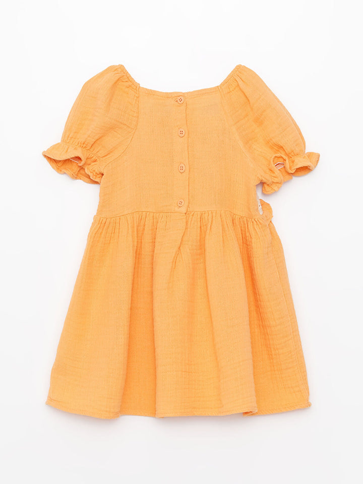 فستان بناتي برقبة مربعة ومزين بالدانتيل باللون البرتقالي