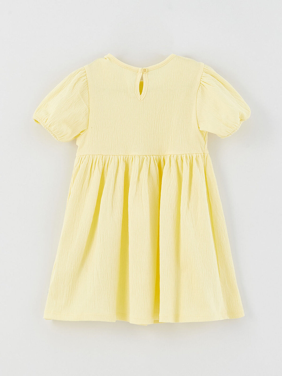 فستان بناتي مطبوع باللون الأصفر برقبة وأكمام قصيرة